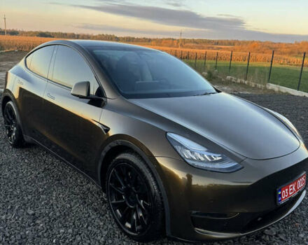 Коричневый Тесла Model Y, объемом двигателя 0 л и пробегом 84 тыс. км за 24990 $, фото 2 на Automoto.ua