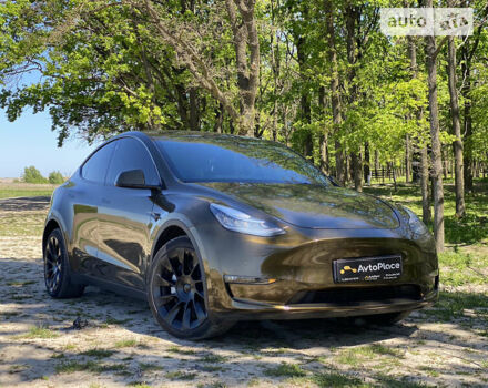 Коричневый Тесла Model Y, объемом двигателя 0 л и пробегом 66 тыс. км за 29999 $, фото 11 на Automoto.ua