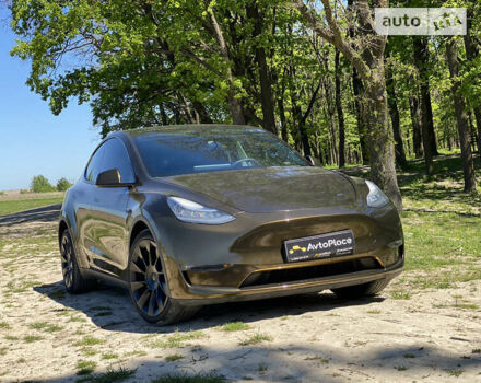 Коричневый Тесла Model Y, объемом двигателя 0 л и пробегом 66 тыс. км за 29999 $, фото 3 на Automoto.ua