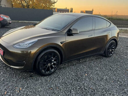 Коричневый Тесла Model Y, объемом двигателя 0 л и пробегом 84 тыс. км за 24990 $, фото 1 на Automoto.ua