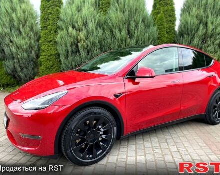 Красный Тесла Model Y, объемом двигателя 0 л и пробегом 70 тыс. км за 33000 $, фото 1 на Automoto.ua