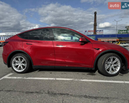Червоний Тесла Model Y, об'ємом двигуна 0 л та пробігом 60 тис. км за 28500 $, фото 2 на Automoto.ua