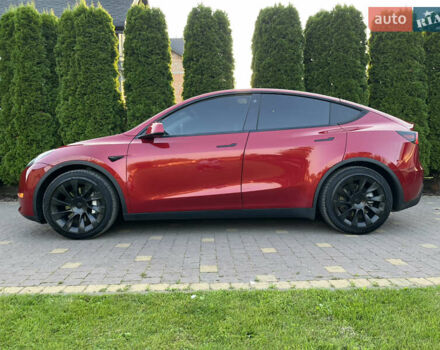 Червоний Тесла Model Y, об'ємом двигуна 0 л та пробігом 89 тис. км за 27999 $, фото 1 на Automoto.ua