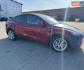 Красный Тесла Model Y, объемом двигателя 0 л и пробегом 121 тыс. км за 23000 $, фото 1 на Automoto.ua