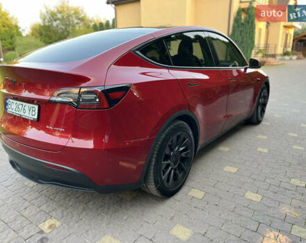 Червоний Тесла Model Y, об'ємом двигуна 0 л та пробігом 89 тис. км за 27999 $, фото 4 на Automoto.ua