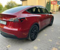 Червоний Тесла Model Y, об'ємом двигуна 0 л та пробігом 89 тис. км за 27999 $, фото 4 на Automoto.ua