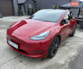 Красный Тесла Model Y, объемом двигателя 0 л и пробегом 140 тыс. км за 23000 $, фото 1 на Automoto.ua