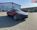 Красный Тесла Model Y, объемом двигателя 0 л и пробегом 121 тыс. км за 23000 $, фото 1 на Automoto.ua