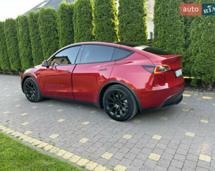 Червоний Тесла Model Y, об'ємом двигуна 0 л та пробігом 89 тис. км за 27999 $, фото 2 на Automoto.ua