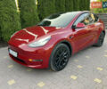 Червоний Тесла Model Y, об'ємом двигуна 0 л та пробігом 89 тис. км за 27999 $, фото 1 на Automoto.ua