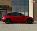 Красный Тесла Model Y, объемом двигателя 0 л и пробегом 100 тыс. км за 25350 $, фото 15 на Automoto.ua