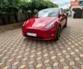 Червоний Тесла Model Y, об'ємом двигуна 0 л та пробігом 66 тис. км за 23850 $, фото 1 на Automoto.ua