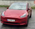 Красный Тесла Model Y, объемом двигателя 0 л и пробегом 57 тыс. км за 27500 $, фото 1 на Automoto.ua