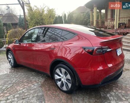 Червоний Тесла Model Y, об'ємом двигуна 0 л та пробігом 24 тис. км за 27800 $, фото 1 на Automoto.ua