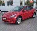Красный Тесла Model Y, объемом двигателя 0 л и пробегом 22 тыс. км за 27499 $, фото 1 на Automoto.ua
