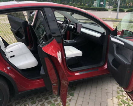 Красный Тесла Model Y, объемом двигателя 0 л и пробегом 6 тыс. км за 33300 $, фото 18 на Automoto.ua