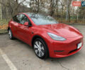 Червоний Тесла Model Y, об'ємом двигуна 0 л та пробігом 21 тис. км за 26900 $, фото 1 на Automoto.ua