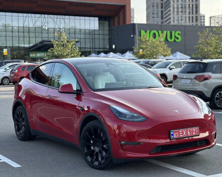 Червоний Тесла Model Y, об'ємом двигуна 0 л та пробігом 50 тис. км за 25300 $, фото 1 на Automoto.ua