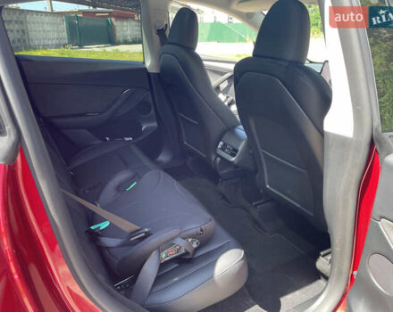 Красный Тесла Model Y, объемом двигателя 0 л и пробегом 2 тыс. км за 34500 $, фото 25 на Automoto.ua