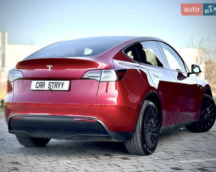 Красный Тесла Model Y, объемом двигателя 0 л и пробегом 8 тыс. км за 29999 $, фото 2 на Automoto.ua