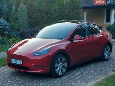 Красный Тесла Model Y, объемом двигателя 0 л и пробегом 143 тыс. км за 19999 $, фото 1 на Automoto.ua