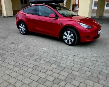 Красный Тесла Model Y, объемом двигателя 0 л и пробегом 143 тыс. км за 20299 $, фото 1 на Automoto.ua