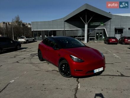 Червоний Тесла Model Y, об'ємом двигуна 0 л та пробігом 77 тис. км за 24990 $, фото 1 на Automoto.ua