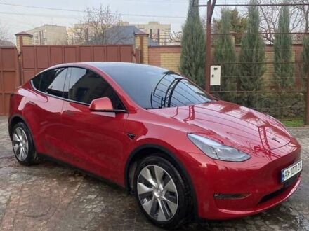 Червоний Тесла Model Y, об'ємом двигуна 0 л та пробігом 24 тис. км за 27800 $, фото 1 на Automoto.ua
