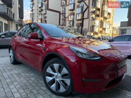 Червоний Тесла Model Y, об'ємом двигуна 0 л та пробігом 83 тис. км за 25999 $, фото 1 на Automoto.ua