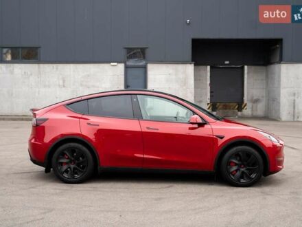 Червоний Тесла Model Y, об'ємом двигуна 0 л та пробігом 88 тис. км за 34500 $, фото 1 на Automoto.ua
