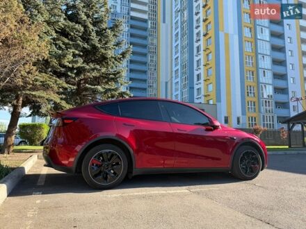 Красный Тесла Model Y, объемом двигателя 0 л и пробегом 49 тыс. км за 30999 $, фото 1 на Automoto.ua