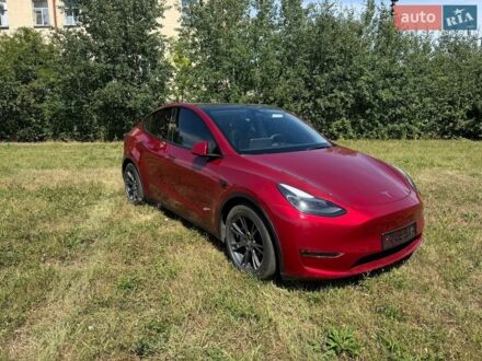 Червоний Тесла Model Y, об'ємом двигуна 0 л та пробігом 22 тис. км за 29299 $, фото 1 на Automoto.ua