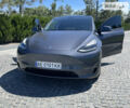 Серый Тесла Model Y, объемом двигателя 0 л и пробегом 15 тыс. км за 58999 $, фото 1 на Automoto.ua