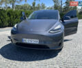 Серый Тесла Model Y, объемом двигателя 0 л и пробегом 15 тыс. км за 49999 $, фото 1 на Automoto.ua
