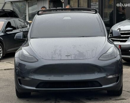 Серый Тесла Model Y, объемом двигателя 0 л и пробегом 98 тыс. км за 29490 $, фото 1 на Automoto.ua