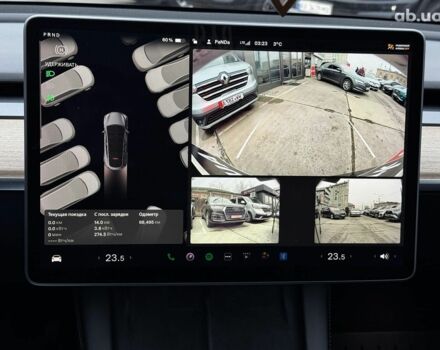 Серый Тесла Model Y, объемом двигателя 0 л и пробегом 98 тыс. км за 29490 $, фото 16 на Automoto.ua
