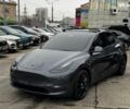 Серый Тесла Model Y, объемом двигателя 0 л и пробегом 98 тыс. км за 29490 $, фото 1 на Automoto.ua