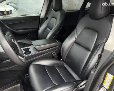 Серый Тесла Model Y, объемом двигателя 0 л и пробегом 98 тыс. км за 29490 $, фото 12 на Automoto.ua