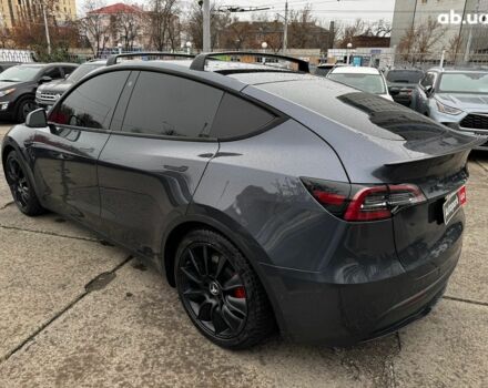 Серый Тесла Model Y, объемом двигателя 0 л и пробегом 98 тыс. км за 29490 $, фото 3 на Automoto.ua
