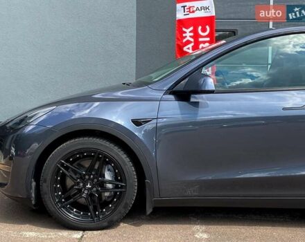 Серый Тесла Model Y, объемом двигателя 0 л и пробегом 123 тыс. км за 23999 $, фото 4 на Automoto.ua
