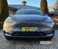 Серый Тесла Model Y, объемом двигателя 75 л и пробегом 58 тыс. км за 24999 $, фото 1 на Automoto.ua