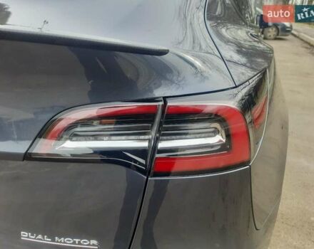 Серый Тесла Model Y, объемом двигателя 0 л и пробегом 48 тыс. км за 24900 $, фото 1 на Automoto.ua