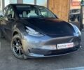 Серый Тесла Model Y, объемом двигателя 0 л и пробегом 81 тыс. км за 22099 $, фото 1 на Automoto.ua