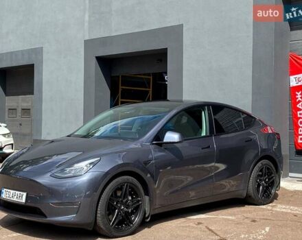 Серый Тесла Model Y, объемом двигателя 0 л и пробегом 123 тыс. км за 23999 $, фото 3 на Automoto.ua