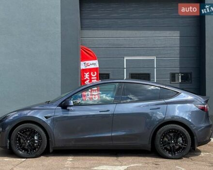 Серый Тесла Model Y, объемом двигателя 0 л и пробегом 123 тыс. км за 23999 $, фото 5 на Automoto.ua