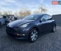 Серый Тесла Model Y, объемом двигателя 0 л и пробегом 143 тыс. км за 19999 $, фото 1 на Automoto.ua