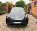 Серый Тесла Model Y, объемом двигателя 0 л и пробегом 41 тыс. км за 28500 $, фото 1 на Automoto.ua