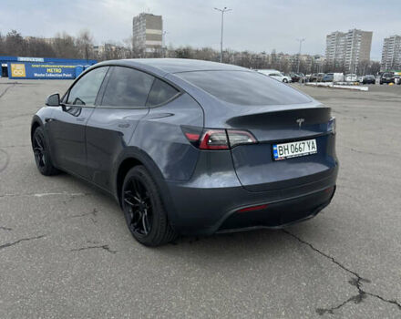 Серый Тесла Model Y, объемом двигателя 0 л и пробегом 99 тыс. км за 22300 $, фото 5 на Automoto.ua