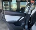 Серый Тесла Model Y, объемом двигателя 0 л и пробегом 81 тыс. км за 22099 $, фото 18 на Automoto.ua