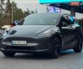 Серый Тесла Model Y, объемом двигателя 0 л и пробегом 74 тыс. км за 19799 $, фото 1 на Automoto.ua